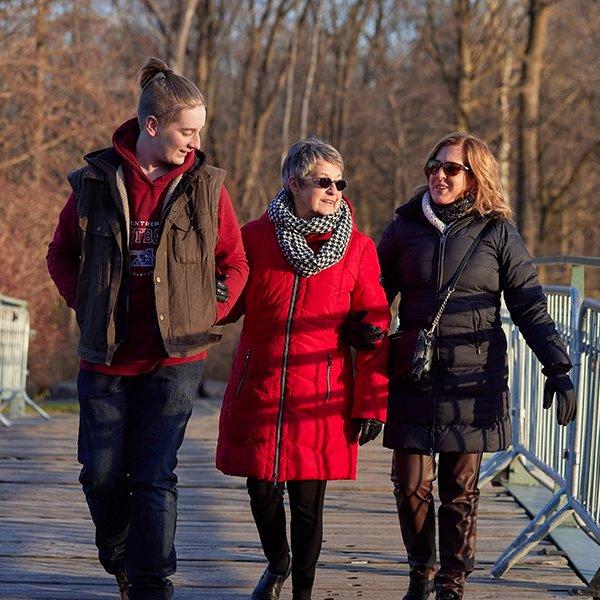 A Dexcom user and their family out for a walk during November's diabetes awareness month. 
